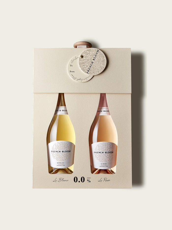 Box of two half bottles French Bloom sparkling wine on a white background