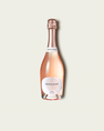 A bottle of French Bloom Le Rosé with pale pink liquid, a white label, and a metallic rose gold foil top, centered on a light beige background.