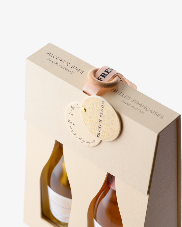 Alcohol-free bottle in packaging with 'Bulles Françaises' branding on a white background