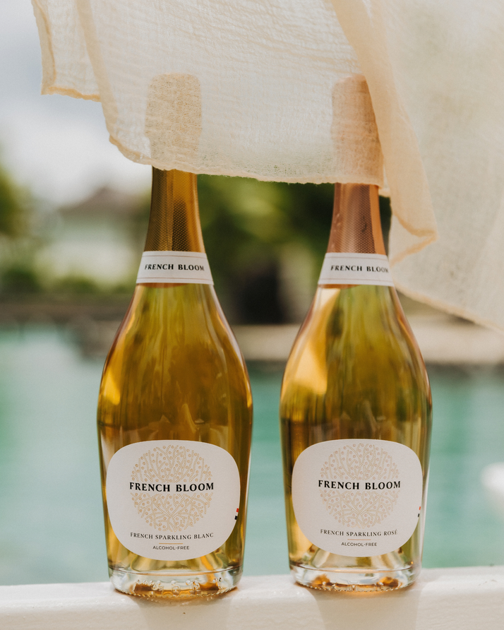 French Bloom Le Blanc and Le Rosé alcohol-free sparkling cuvées by the pool.