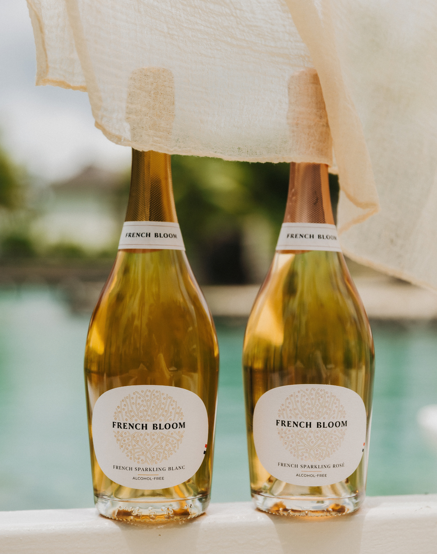 French Bloom Le Blanc and Le Rosé alcohol-free sparkling cuvées by the pool.