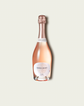 A bottle of French Bloom Le Rosé with pale pink liquid, a white label, and a metallic rose gold foil top, centered on a light beige background.
